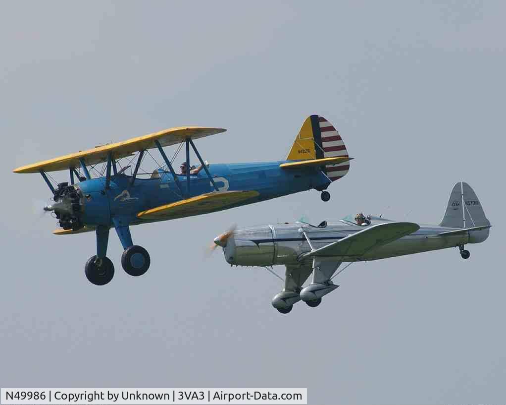 N49986, 1942 Boeing A75N1(PT17) C/N 75-1726, In formation with a Ryan PT-22
