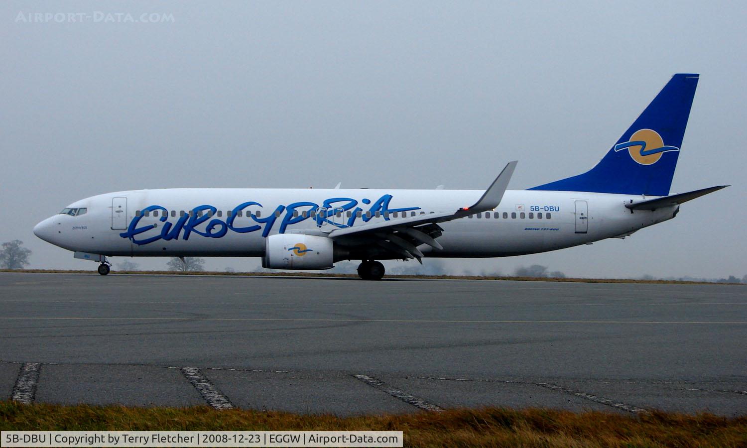 5B-DBU, 2003 Boeing 737-8Q8 C/N 32796, Eurocypria Boeing 737 lands at Luton on a grey December Day