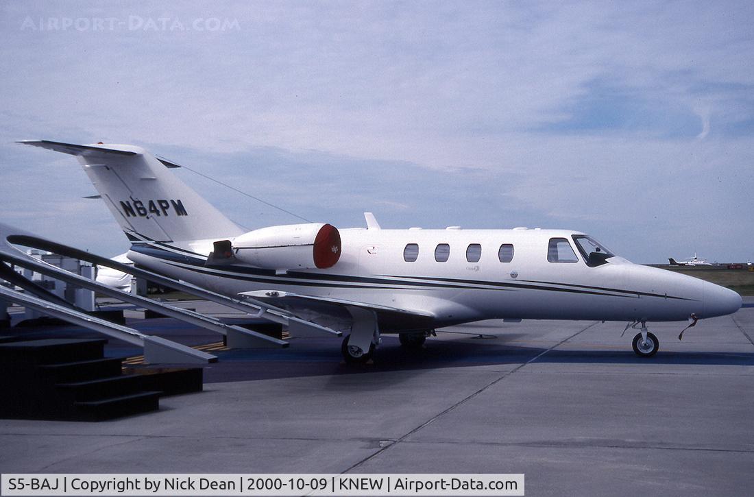 S5-BAJ, 2000 Cessna 525 CitationJet C/N 525-0394, KNEW (Seen here as N64PM this reg is now carried by a RB390 the CJ has become S5-BAJ as posted for C/N accuracy)