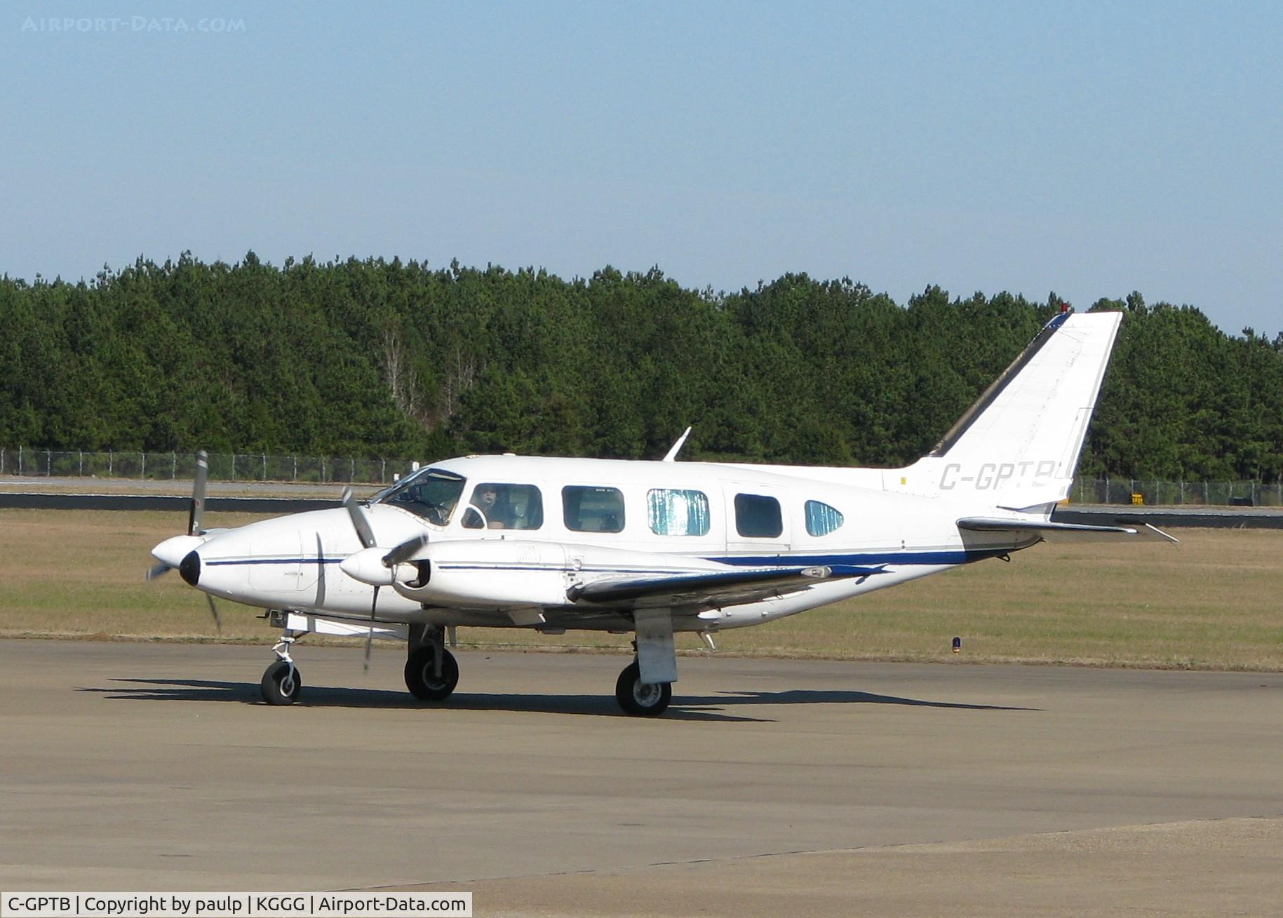 C-GPTB, 1972 Piper PA-31 Turbo Navajo B C/N 31-836, Taxiing at Longview/East Texas Regional.