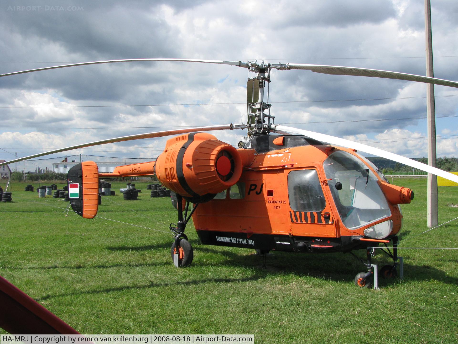 HA-MRJ, 1971 Kamov Ka-26 Hoodlum C/N 7001401, in front of restaurant alongside road Hw8 Hungary