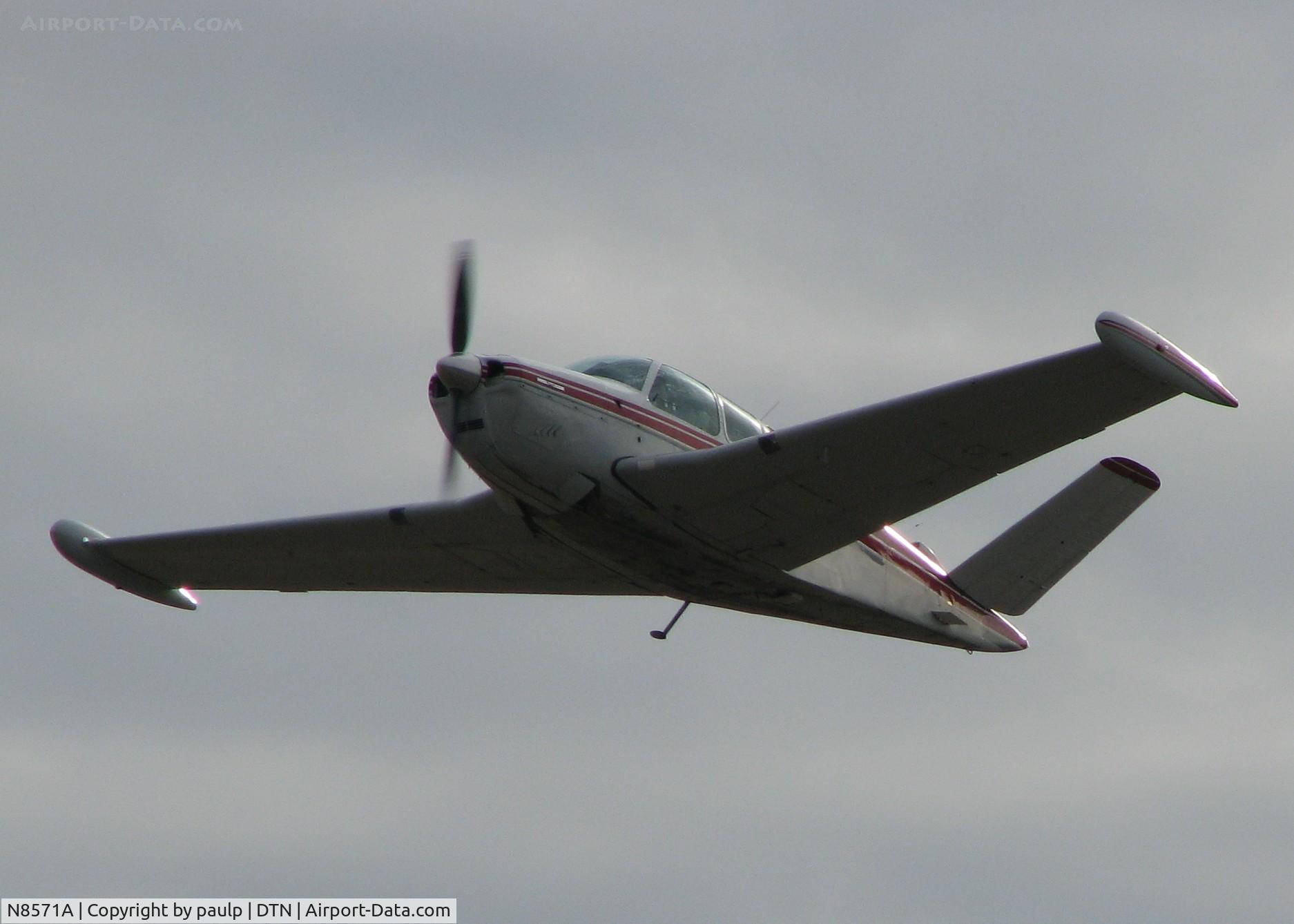 N8571A, 1949 Beech A35 Bonanza C/N D-1993, Taking off from Downtown Shreveport.