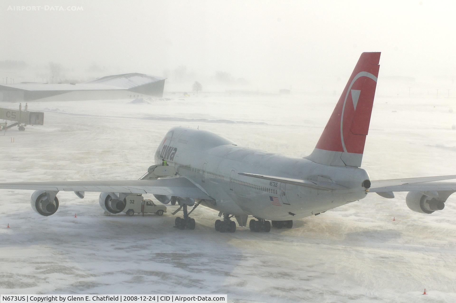 N673US, 1999 Boeing 747-451 C/N 30268, Parked the cargo ramp.  Seen from fourth floor window of control tower.  Stair truck has arrived