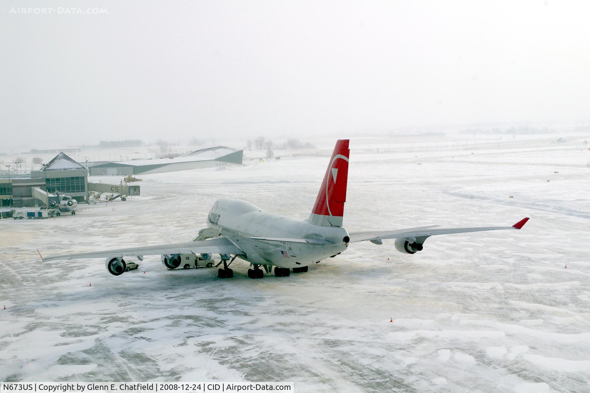 N673US, 1999 Boeing 747-451 C/N 30268, Parked the cargo ramp.  Seen from fourth floor window of control tower.  Wide angle