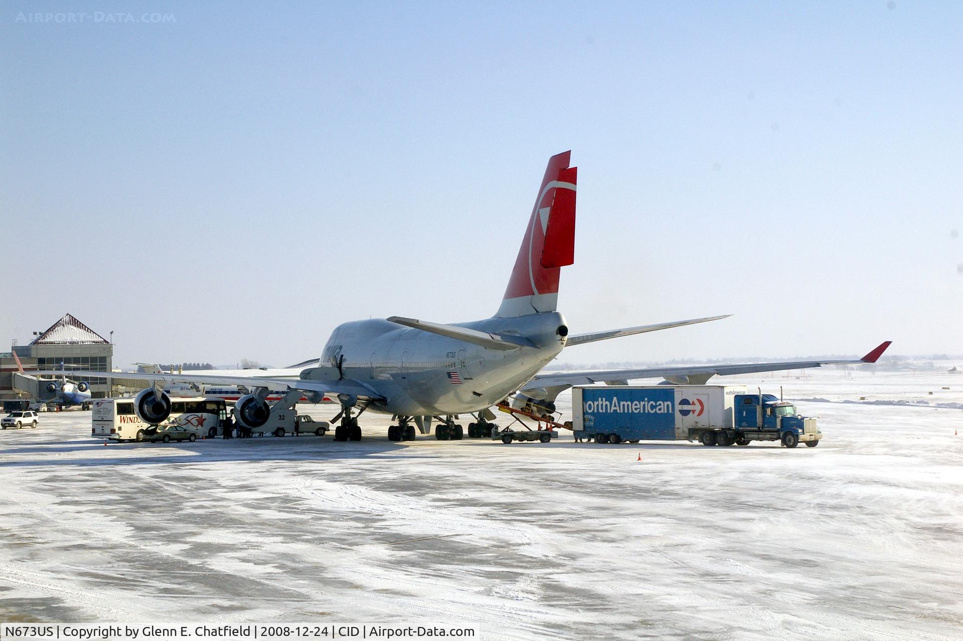 N673US, 1999 Boeing 747-451 C/N 30268, Bus with the U of I football team has arrived.