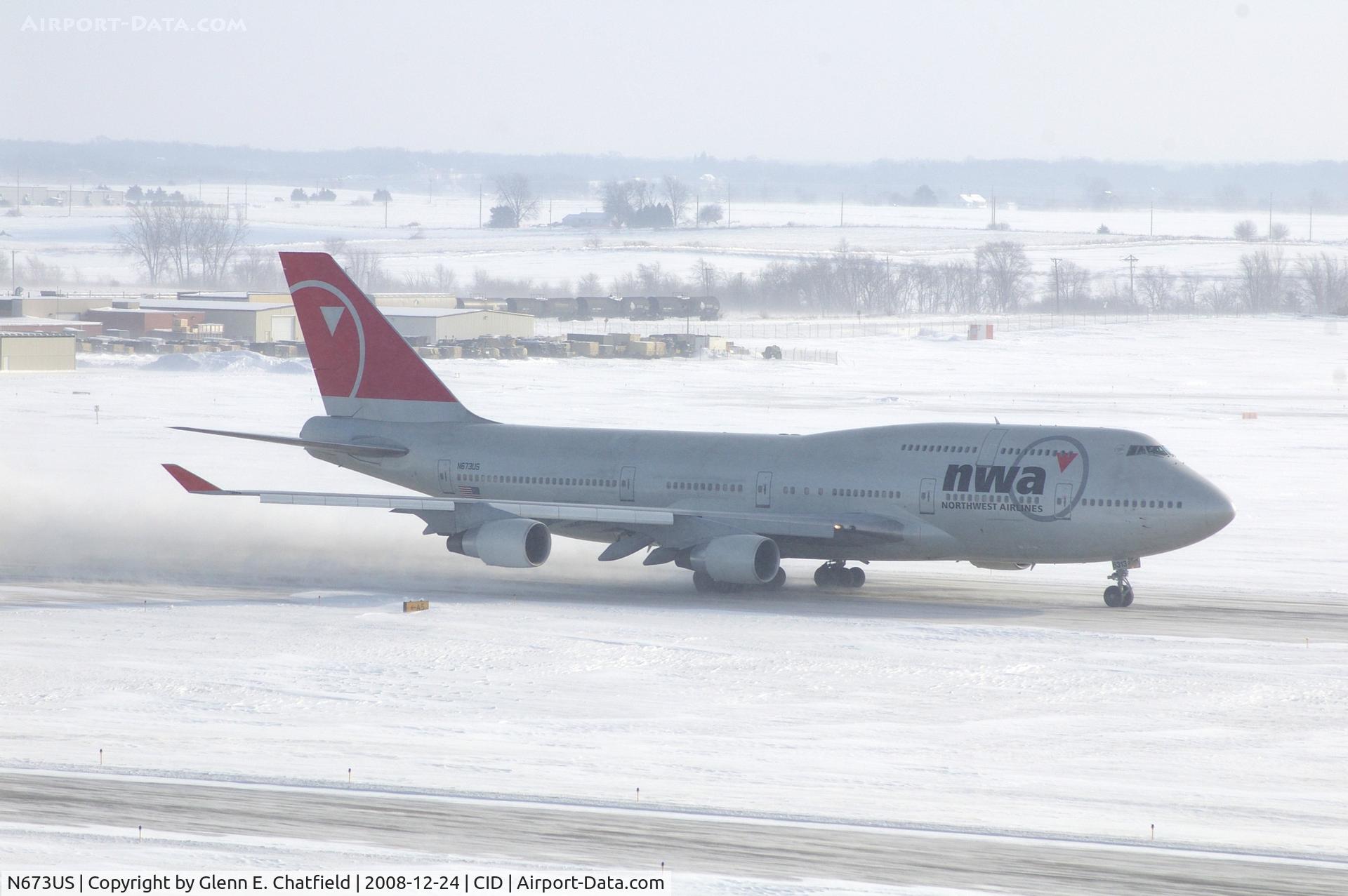 N673US, 1999 Boeing 747-451 C/N 30268, NWA9980 Runway 27 take-off roll. Wind 280@25-30 kt and I'm outside on the tower catwalk