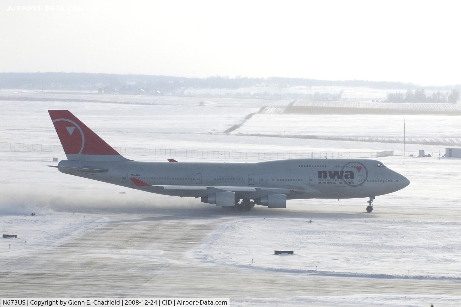 N673US, 1999 Boeing 747-451 C/N 30268, NWA9980 about 2400 feet into take-off roll. Wind 280@25-30 kt and I'm outside on the tower catwalk