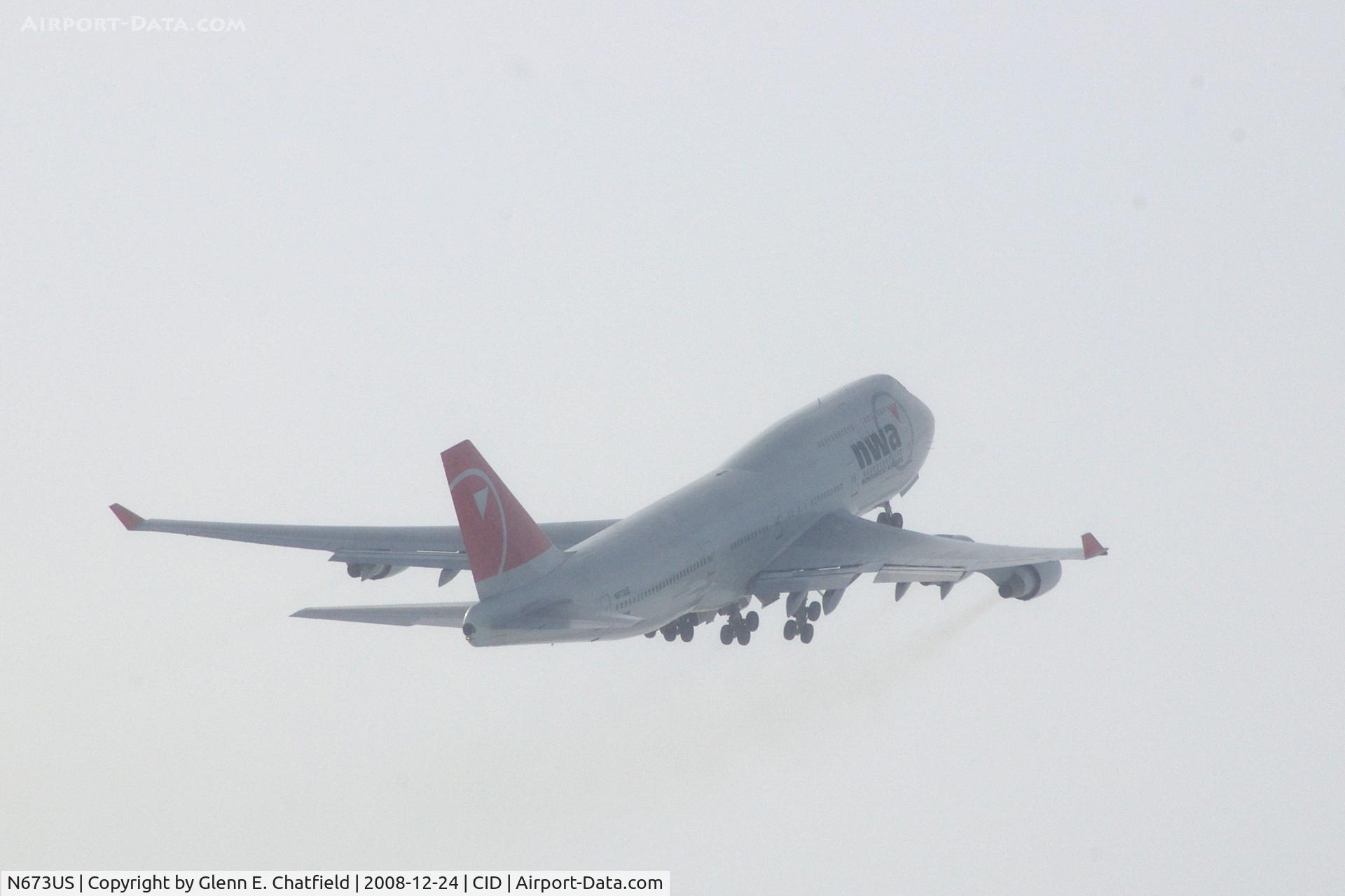 N673US, 1999 Boeing 747-451 C/N 30268, NW9980 on the way to Tampa.  Looking into the sun