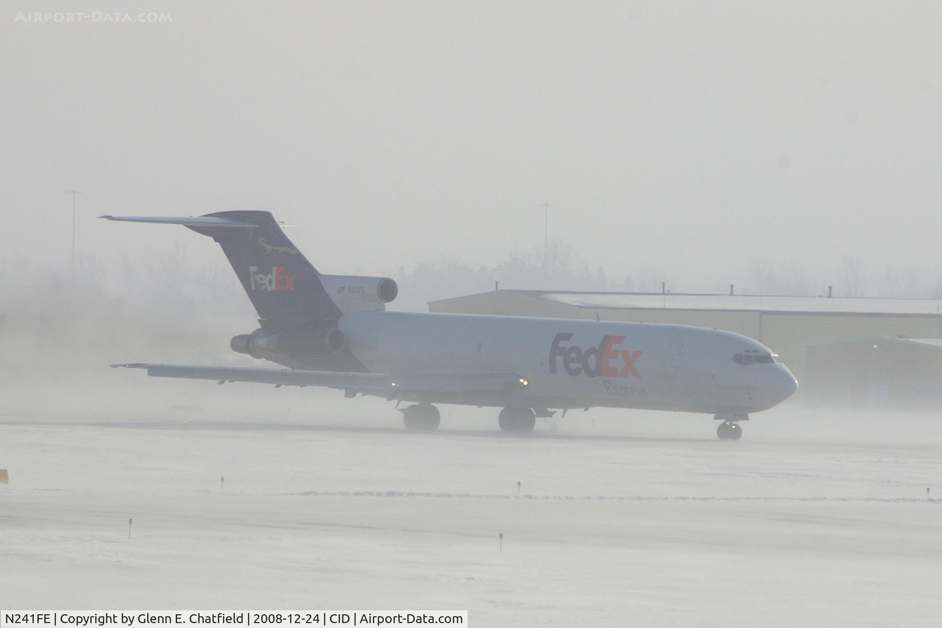 N241FE, 1975 Boeing 727-277 C/N 20979, On take-off roll Runway 27.  Blowing snow
