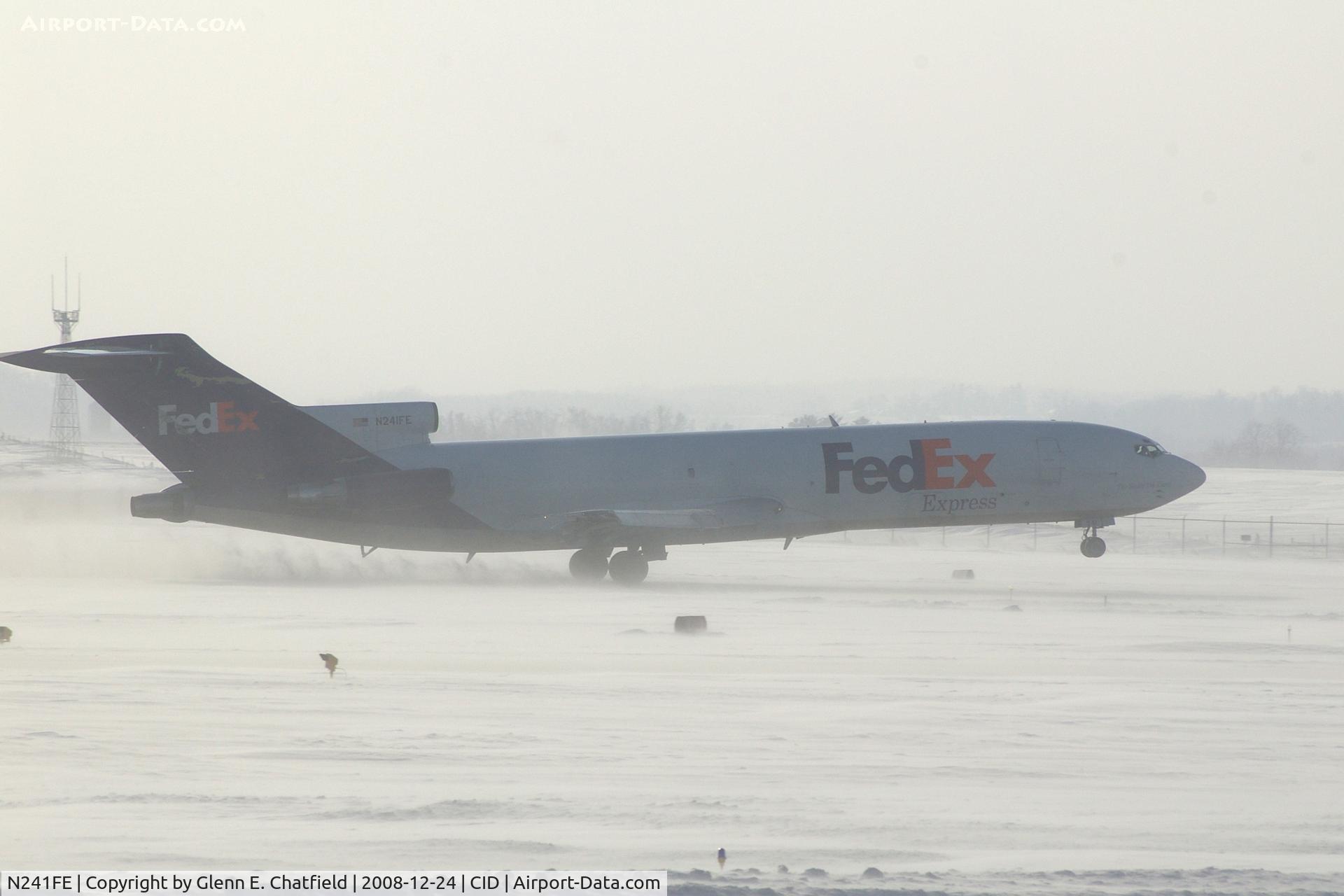 N241FE, 1975 Boeing 727-277 C/N 20979, On take-off roll Runway 27, rotating about 3000 feet.  Blowing snow, wind 25-30 kts from west