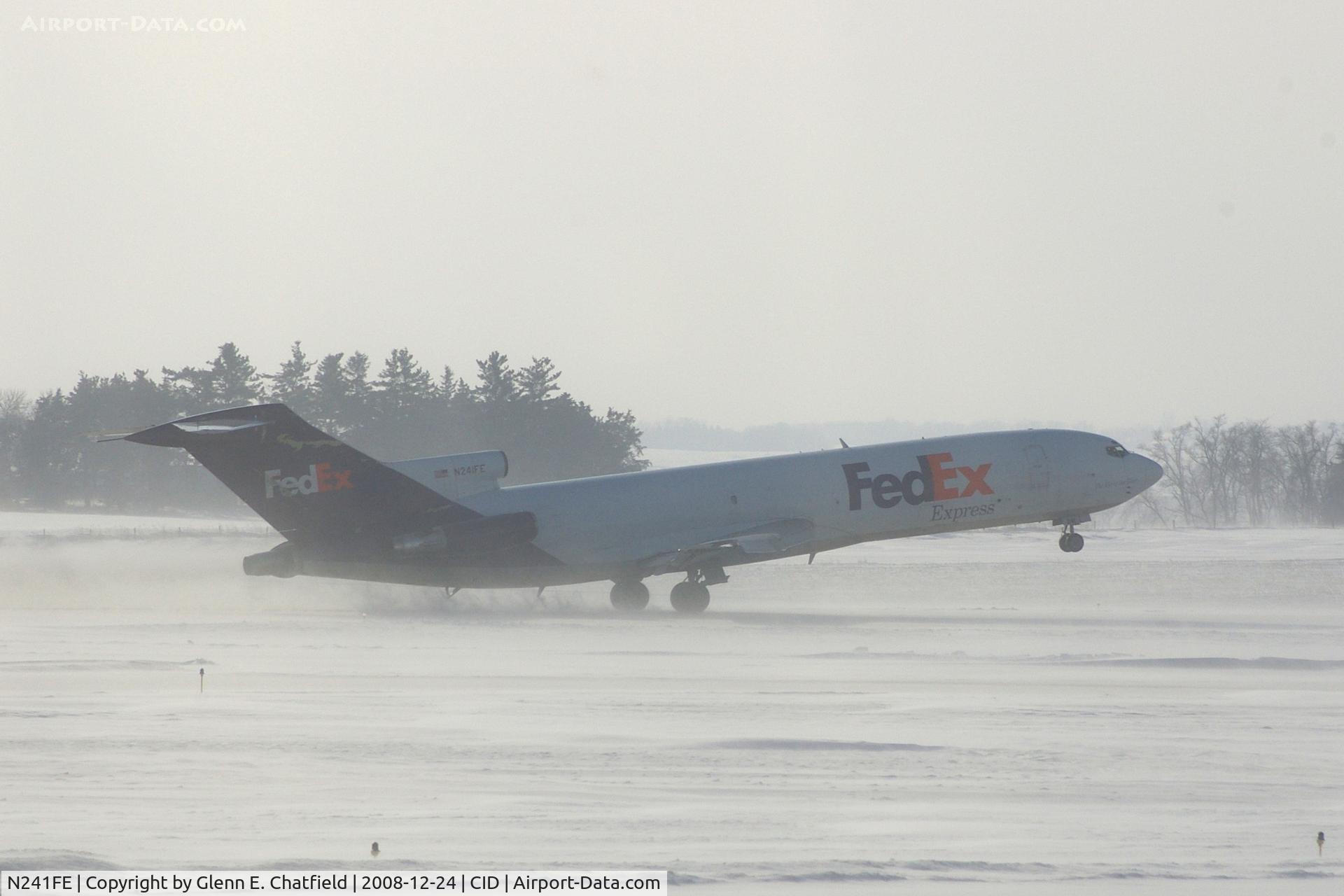 N241FE, 1975 Boeing 727-277 C/N 20979, On take-off roll Runway 27, about 3400 feet.  Blowing snow, wind 25-30 kts from west