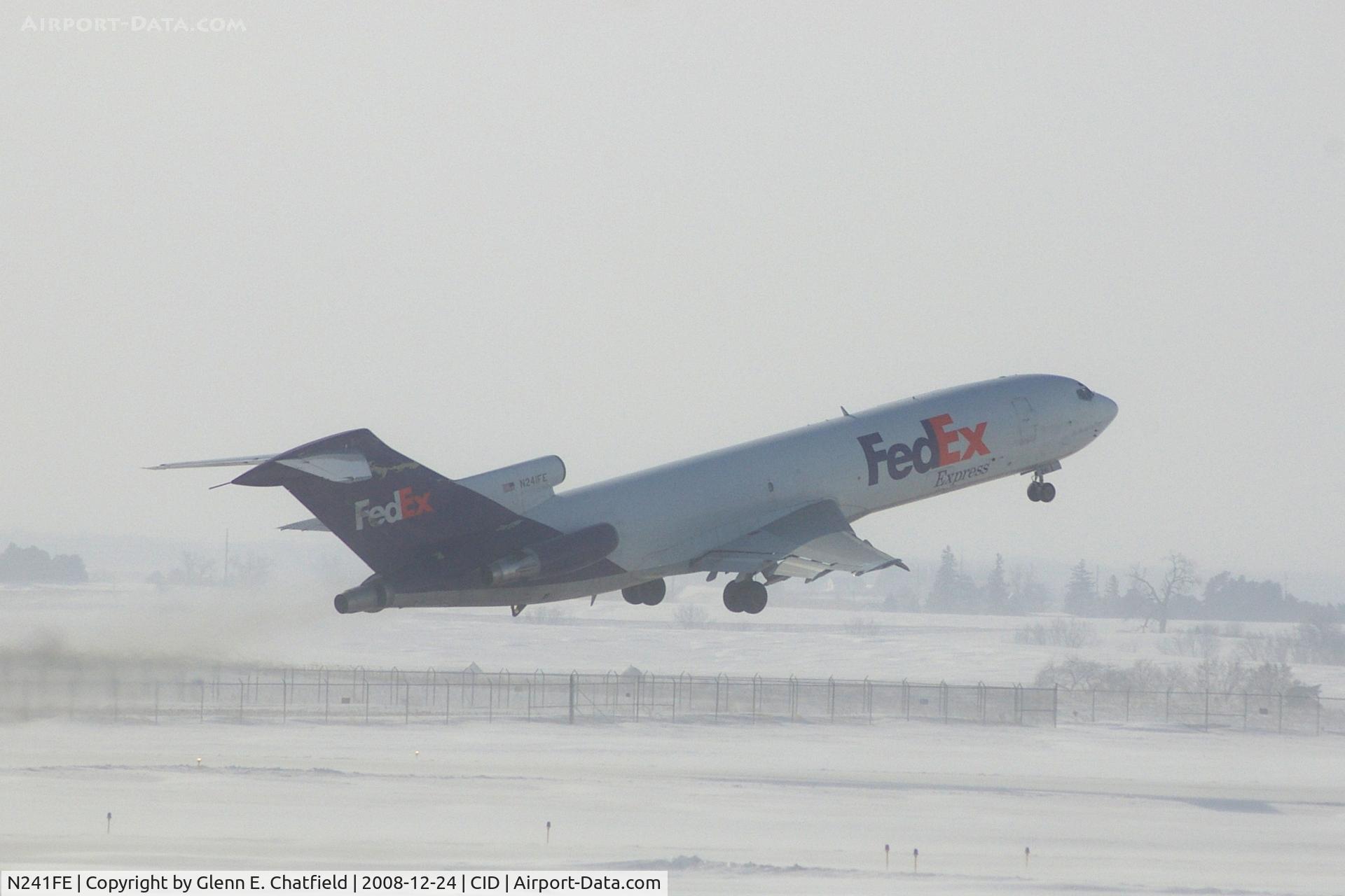 N241FE, 1975 Boeing 727-277 C/N 20979, Airborne off Runway 27 about 4000 feet.  Blowing snow, wind 25-30 kts from west