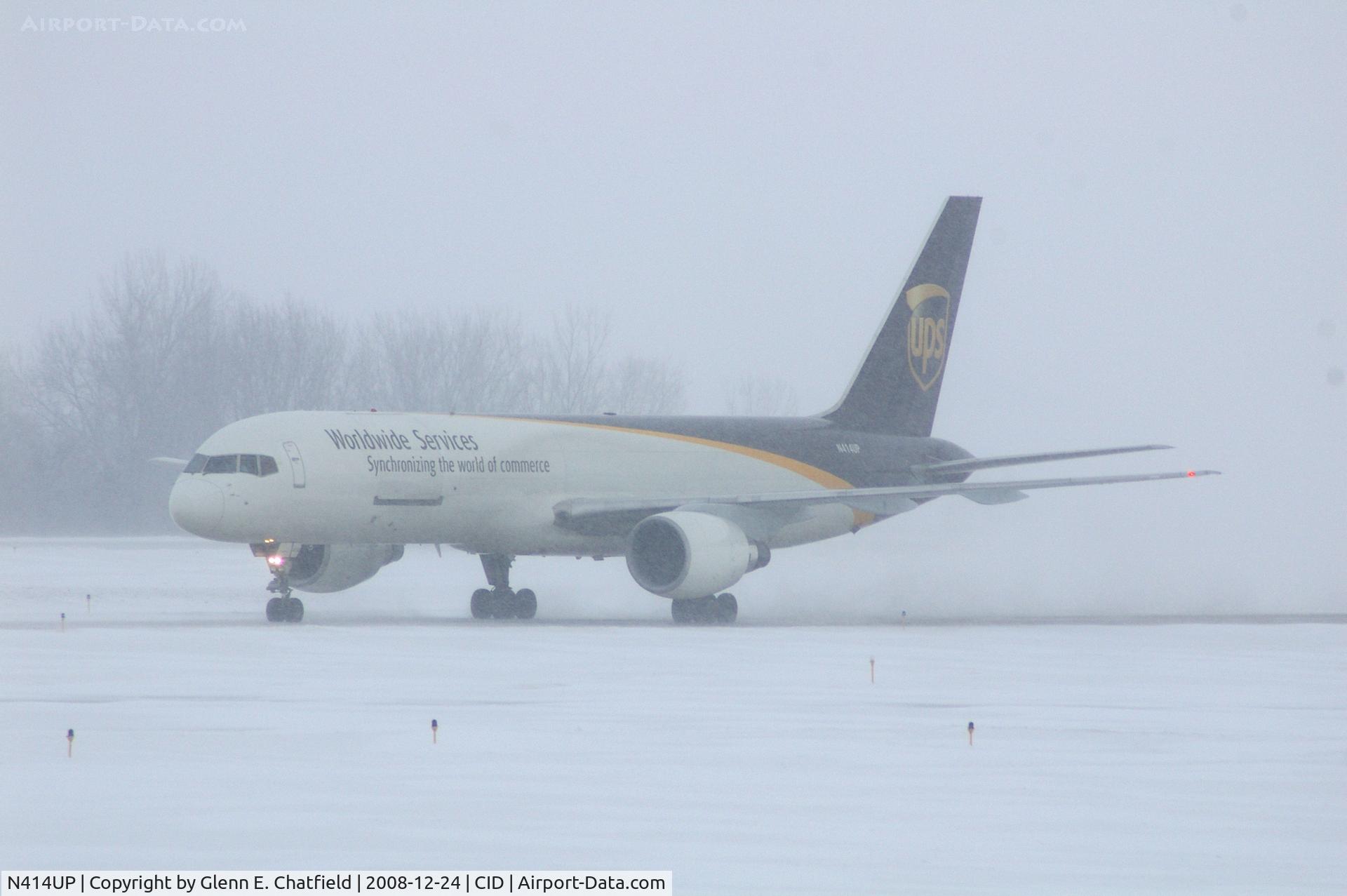 N414UP, 1988 Boeing 757-24APF C/N 23854, Taxiing to cargo ramp via Alpha.  Early morning in the snow.