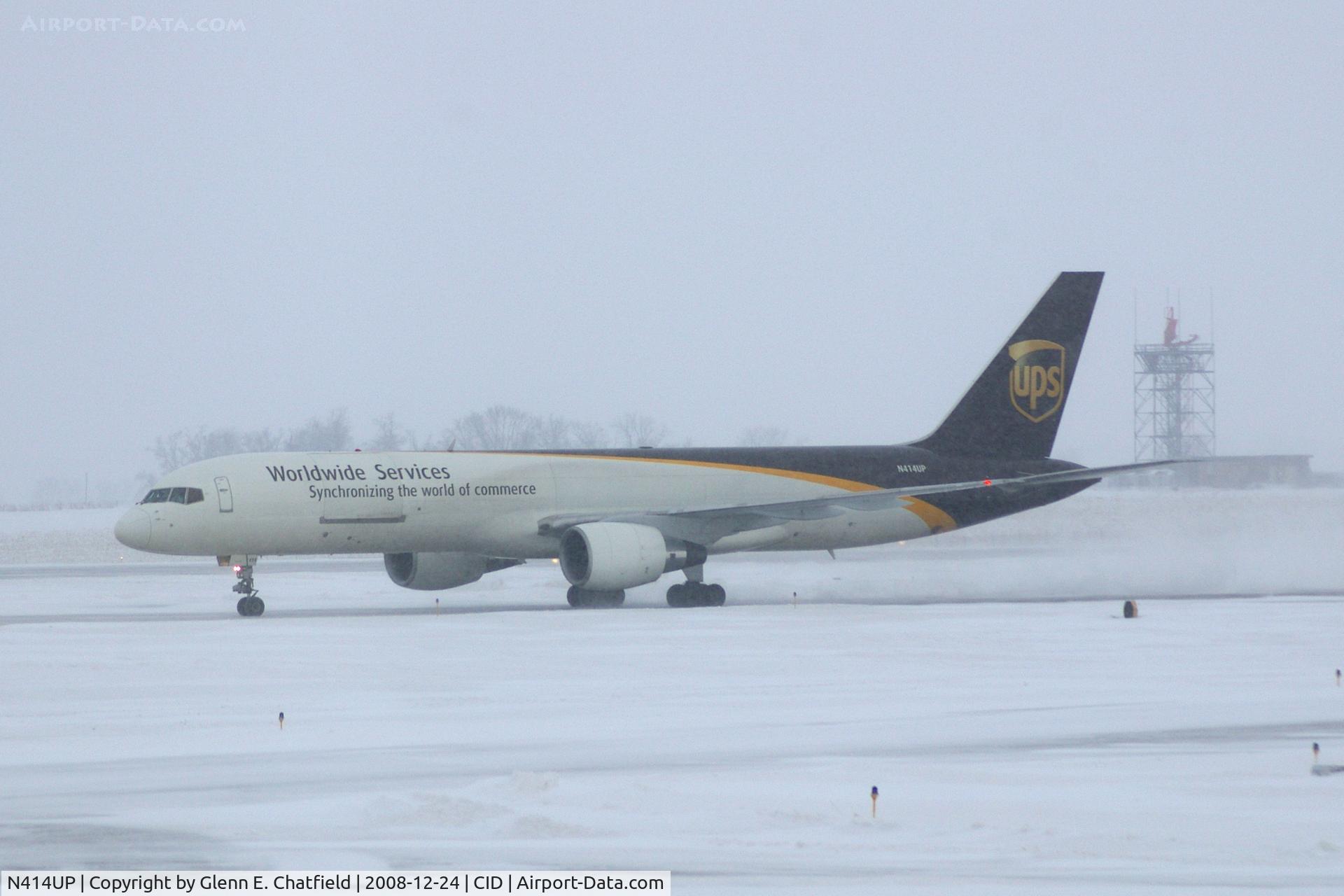 N414UP, 1988 Boeing 757-24APF C/N 23854, Taxiing to cargo ramp via Alpha.  Early morning in the snow.