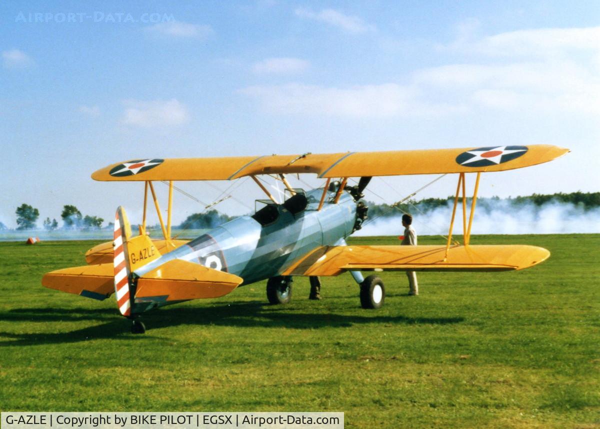 G-AZLE, 1940 Boeing E-75 C/N 75-8543, CARRYING AN EARLIER COLOR SCHEME AT NORTH WEALD IN 1993
