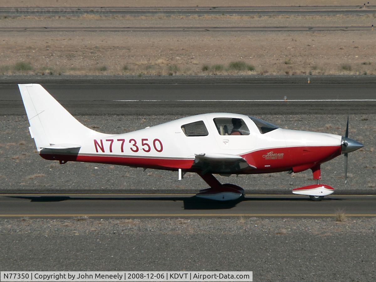 N77350, 2003 Lancair LC42-550FG C/N 42013, Taxiing past the terminal