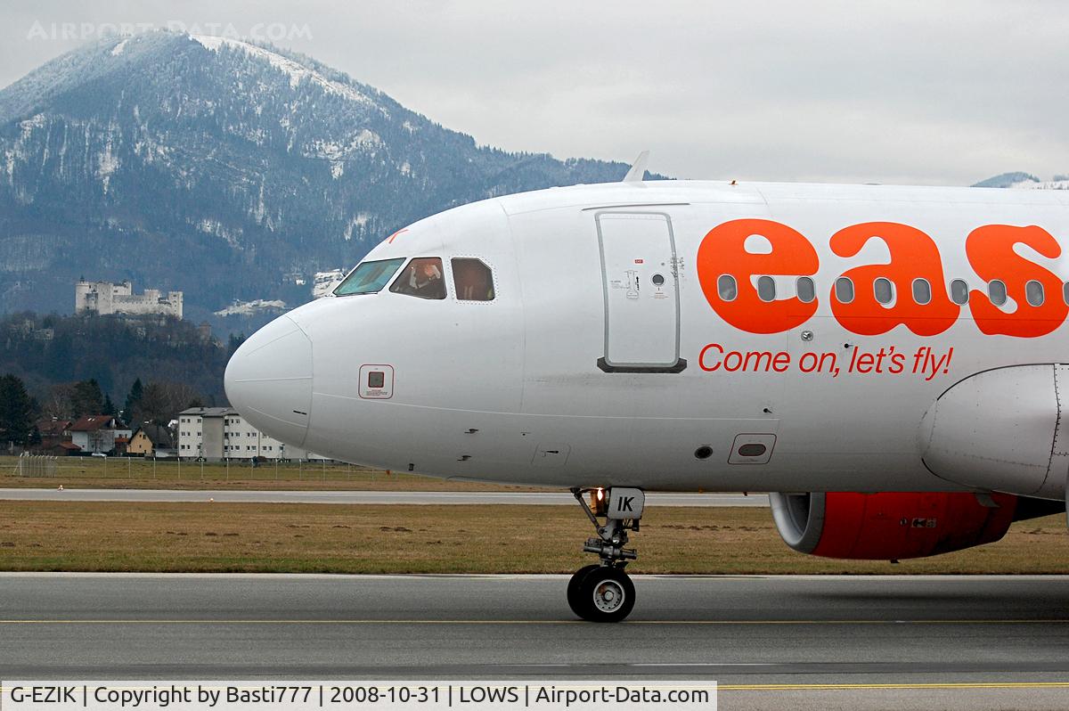 G-EZIK, 2005 Airbus A319-111 C/N 2481, Captain with a smart wave;-)