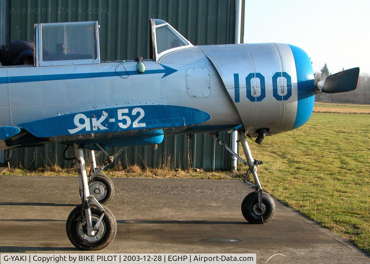 G-YAKI, 1986 Bacau Yak-52 C/N 866904, BEING PRE-FLIGHTED FOR A TRIP TO LASHAM