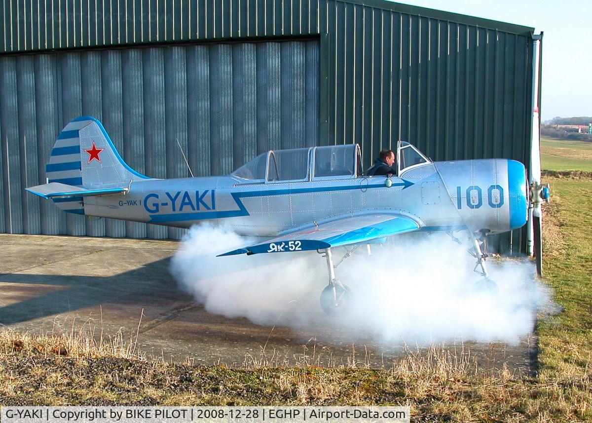 G-YAKI, 1986 Bacau Yak-52 C/N 866904, NEEDS TO GIVE UP THE CIGARS