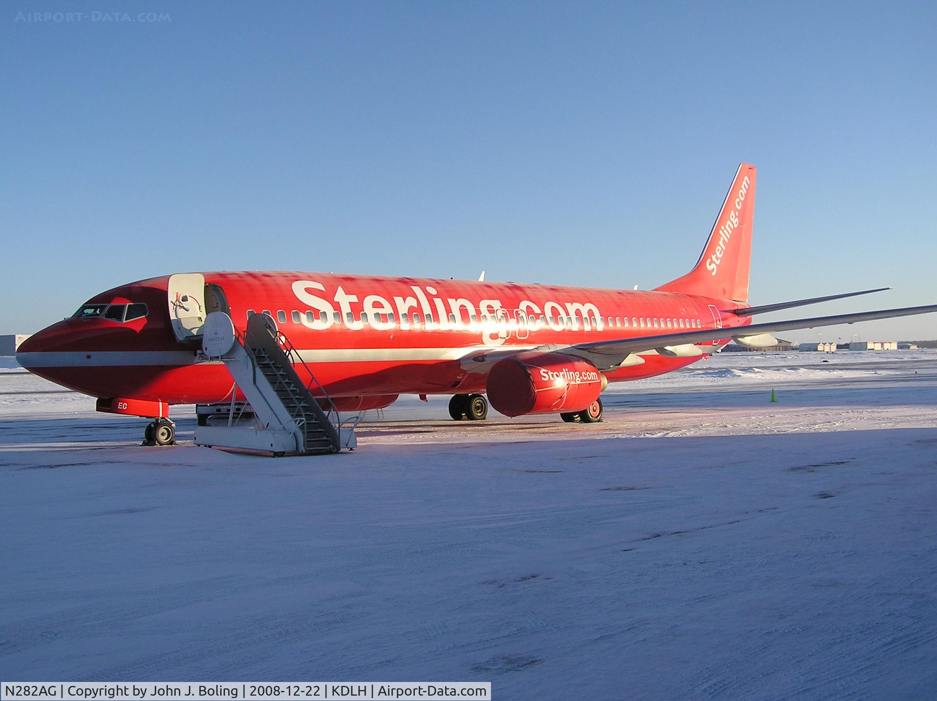 N282AG, 1999 Boeing 737-8Q8 C/N 28221, Overnight at KDLH. Ferry to KVCV on 22 Dec by Burns & Boling. Minus 26 at pre-flight.