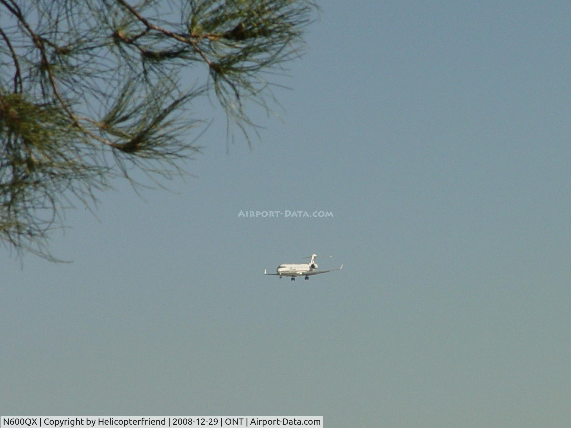 N600QX, 2001 Bombardier CRJ-701 (CL-600-2C10) Regional Jet C/N 10005, On final to ontario