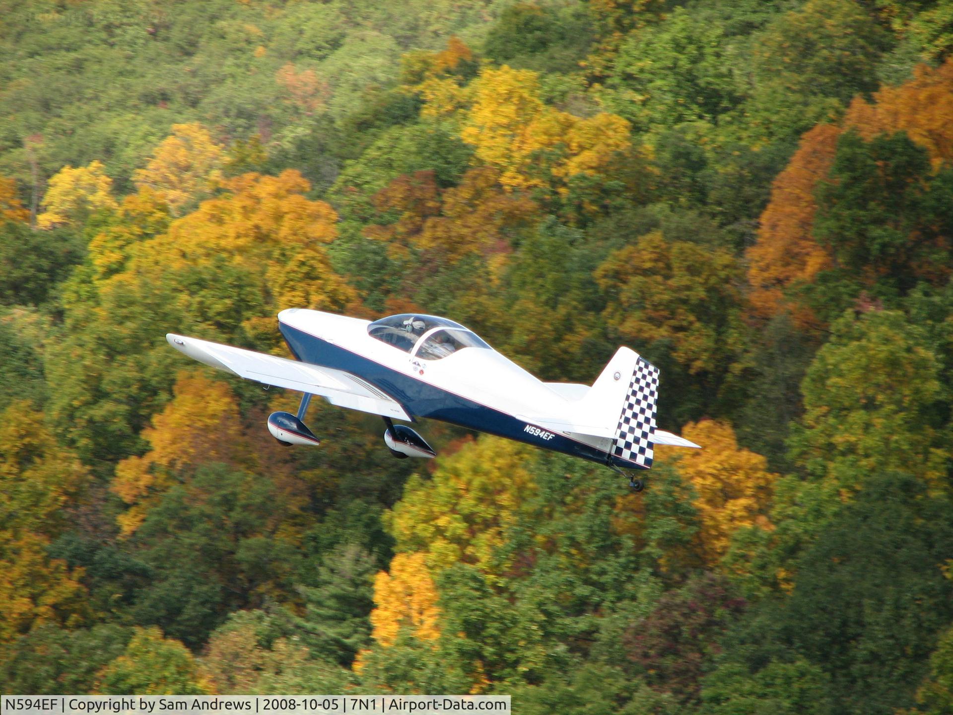 N594EF, 2002 Vans RV-6 C/N 22317, Just leaving.  This one had a pretty good climb rate going.  I think this picture is better than the ones of it sitting on the ground.  Although the one taxiing is pretty good.