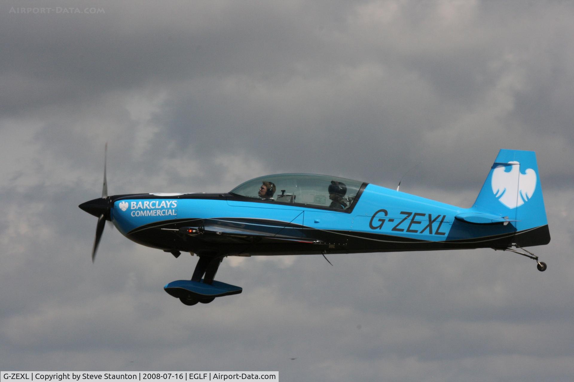 G-ZEXL, 2006 Extra EA-300L C/N 1225, Taken at Farnborough Airshow on the Wednesday trade day, 16th July 2009