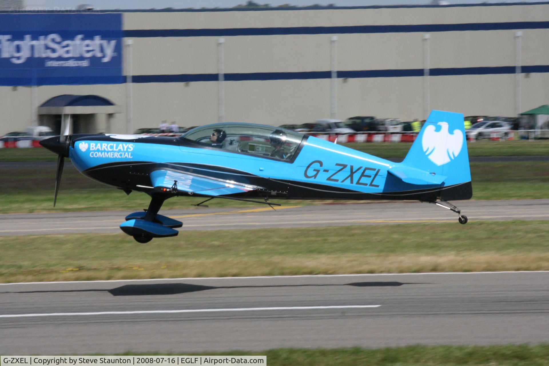 G-ZXEL, 2006 Extra EA-300L C/N 1224, Taken at Farnborough Airshow on the Wednesday trade day, 16th July 2009