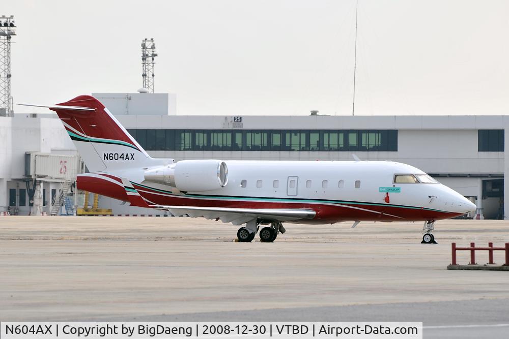 N604AX, 1997 Canadair Challenger 604 (CL-600-2B16) C/N 5342, In Bangkok's afternoon sun.