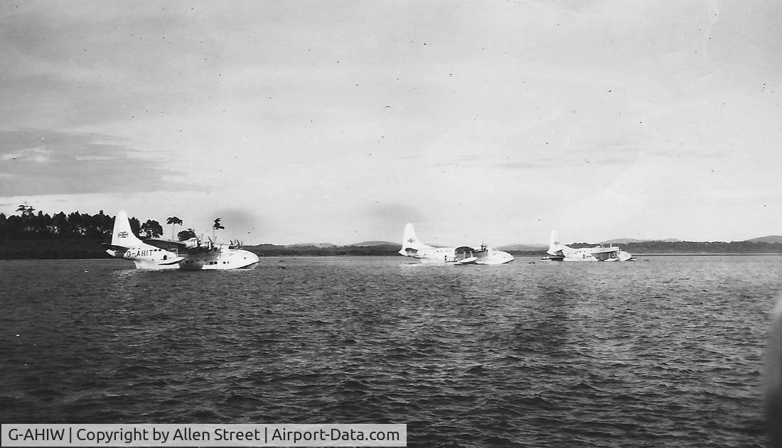 G-AHIW, Short S45 Solent 3 C/N S.1309, G-AHIW is the aircraft on the right of the photo, the aircraft was at anchor at Vaal Dam in South Africa c1946, the picture was taken by my late Father who was an engineer with B.O.A.C. at the time