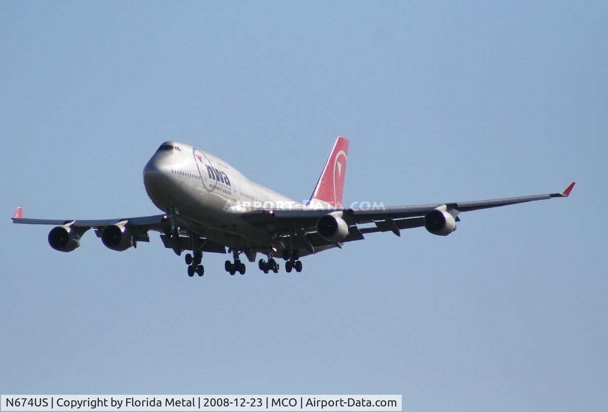 N674US, 1999 Boeing 747-451 C/N 30269, Northwest 747-400 bringing Wisconsin Badgers to Orlando to play the Champs Sports Bowl