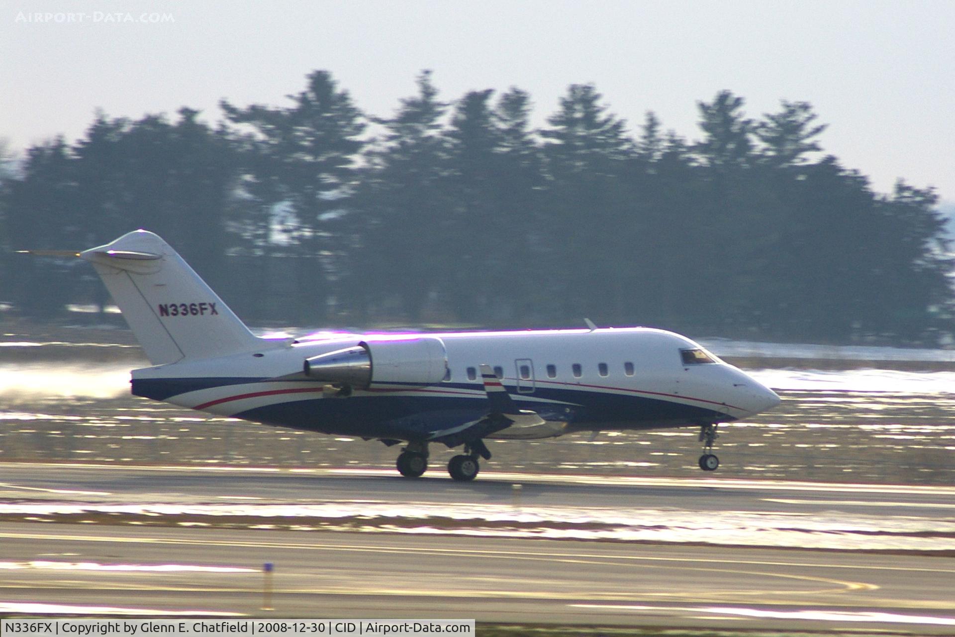 N336FX, 2005 Bombardier Challenger 604 (CL-600-2B16) C/N 5634, Take-off roll on Runway 27, rotating at about 2700 feet
