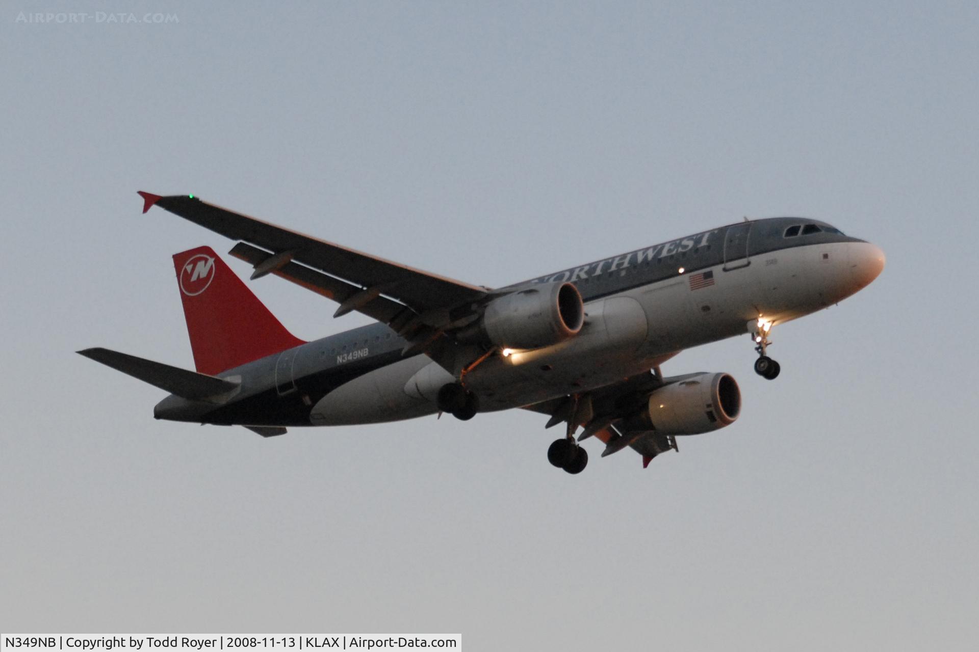 N349NB, 2002 Airbus A319-114 C/N 1815, Landing 24R at LAX, taken well after sunset.
