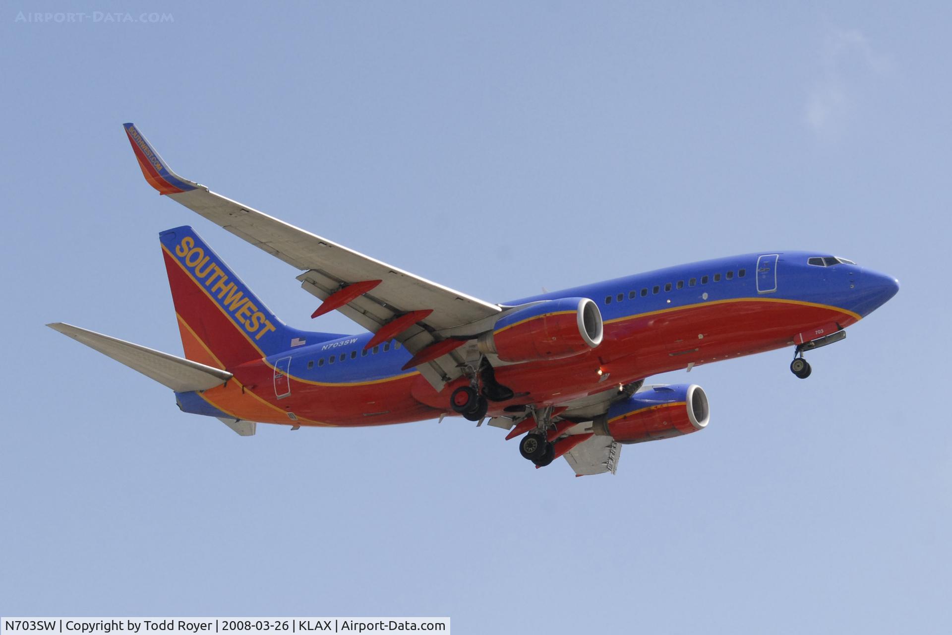 N703SW, 1997 Boeing 737-7H4 C/N 27837, Landing 24R at LAX