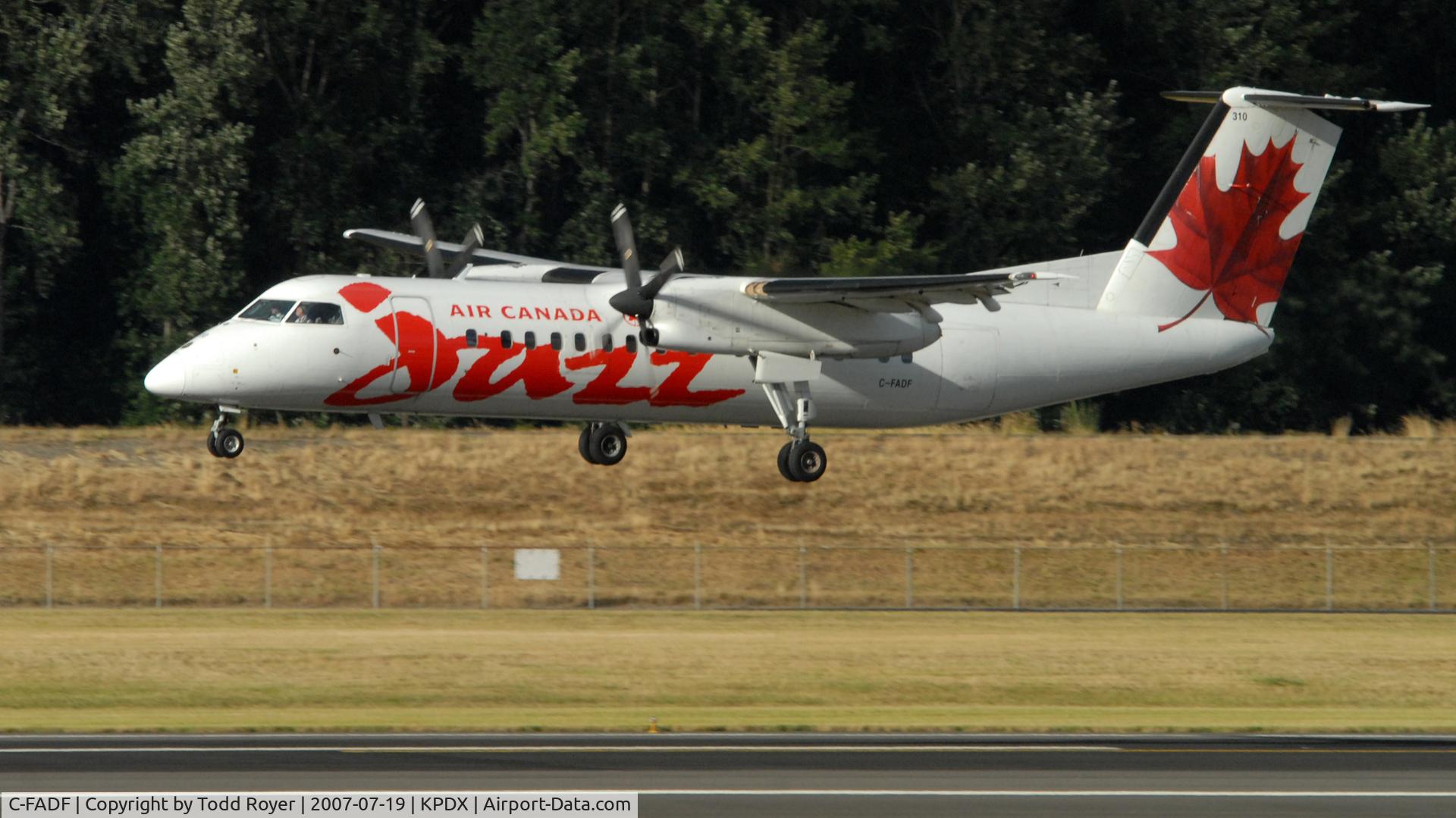 C-FADF, 1991 De Havilland Canada DHC-8-311 Dash 8 C/N 272, Landing 28R at PDX
