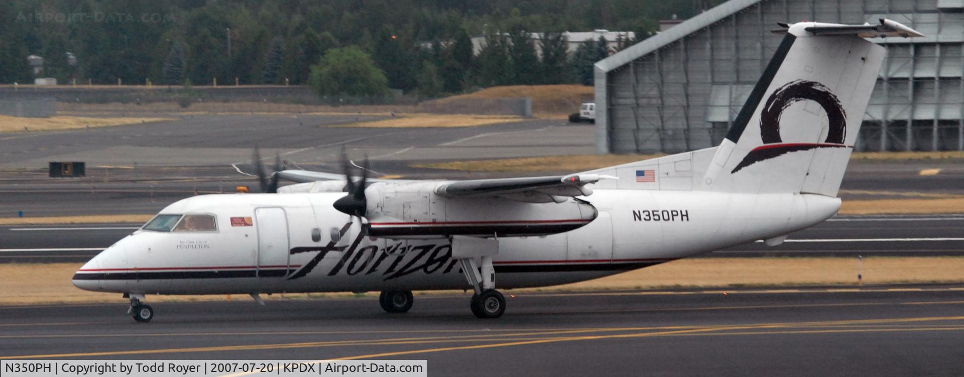 N350PH, 1997 De Havilland Canada DHC-8-202 Dash 8 C/N 488, Taxi to gate
