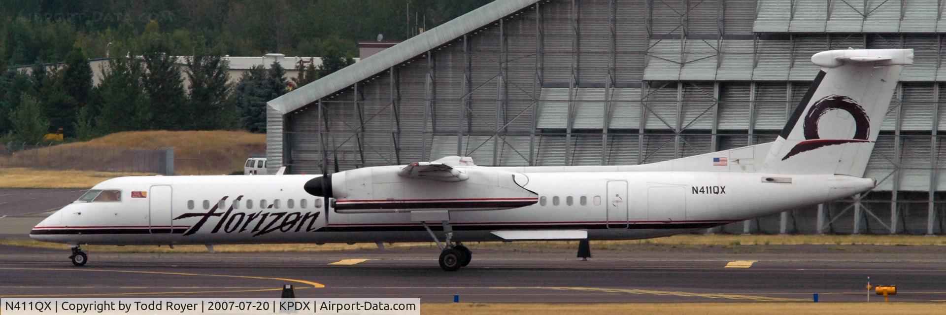 N411QX, 2001 Bombardier DHC-8-402 Dash 8 C/N 4055, Taxi to gate