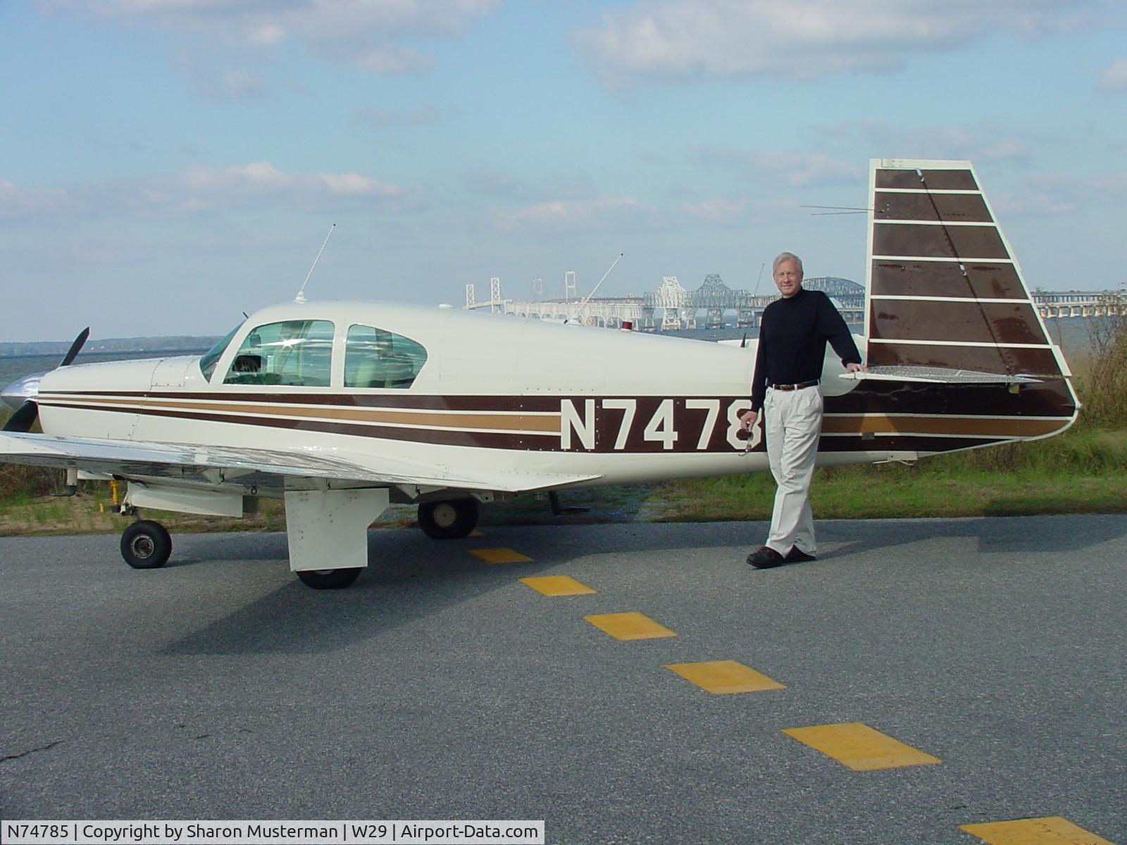 N74785, 1961 Mooney M20B Mark 21 C/N 1785, N74785 in front of Chesapeake Bay Bridge (W29)