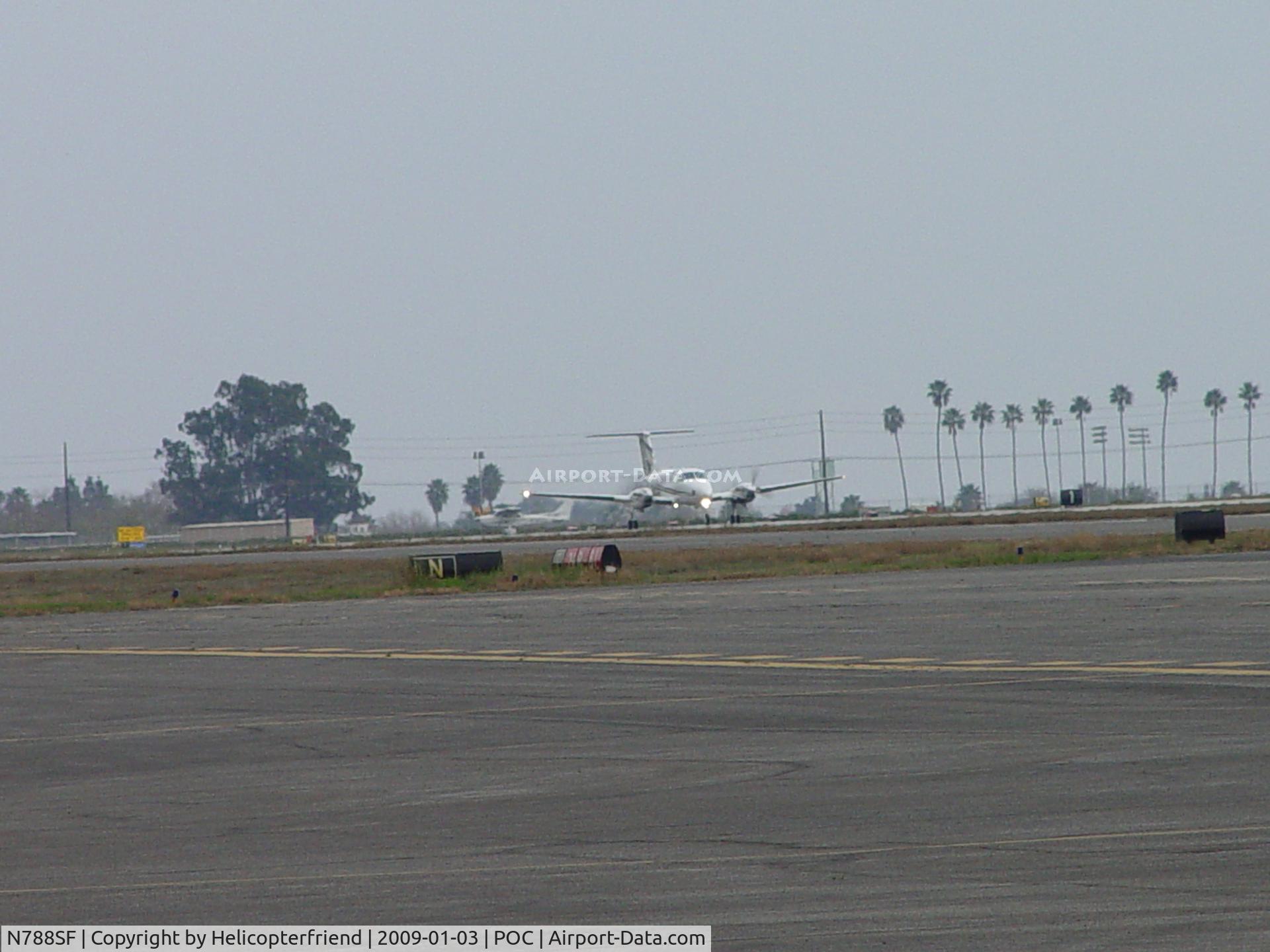 N788SF, Raytheon Aircraft Company B200 C/N BB-1857, On the runway starting roll for take off