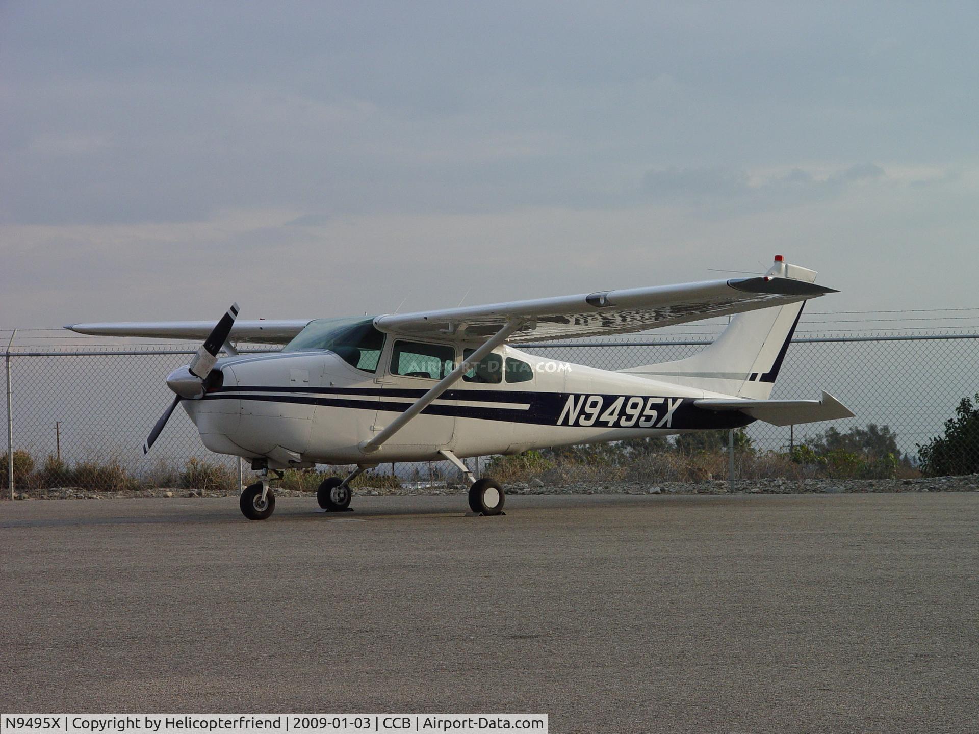 N9495X, 1961 Cessna 210A C/N 21057795, Parked at south fence of Cable