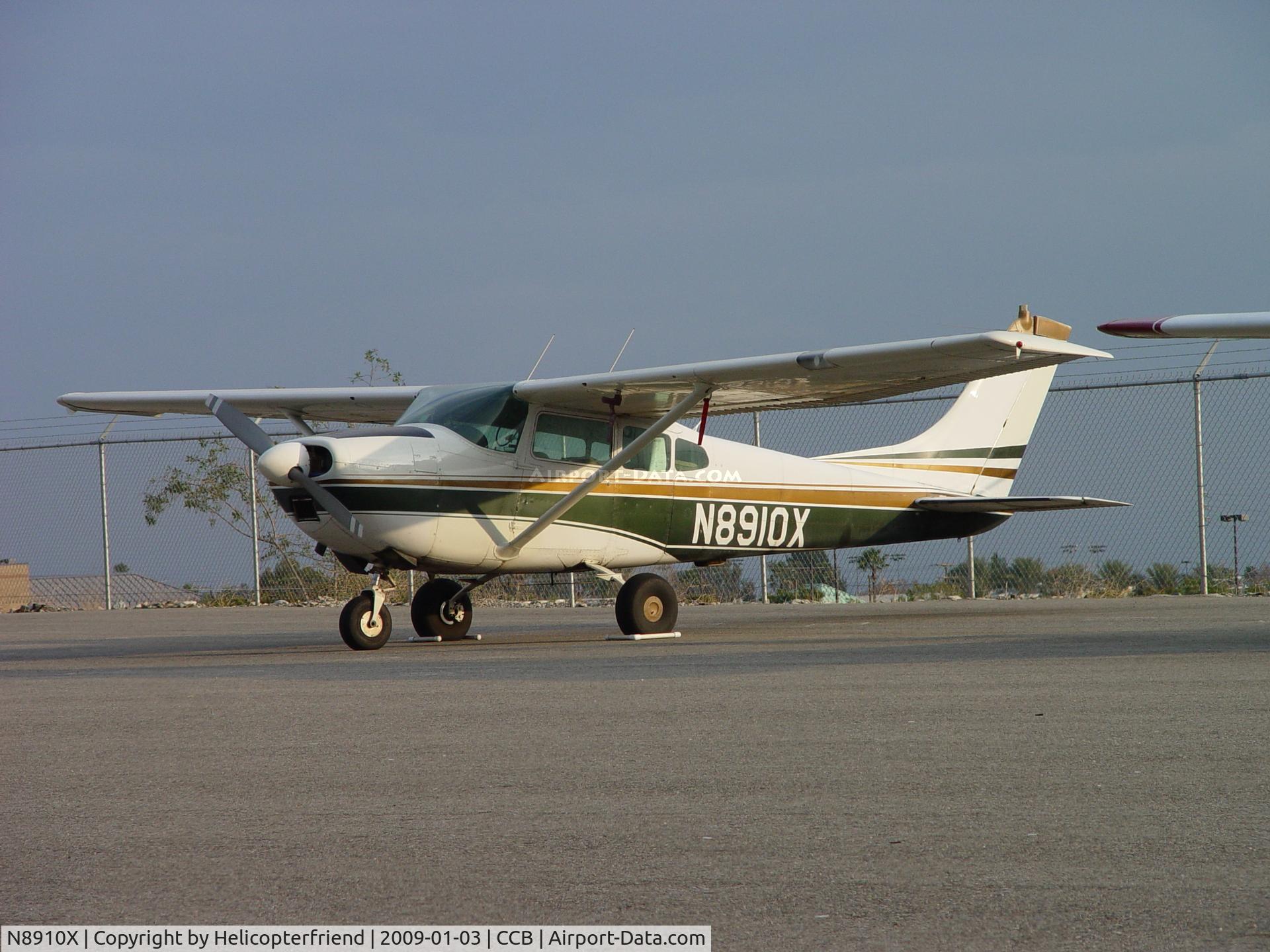N8910X, 1961 Cessna 182D Skylane C/N 18253310, Parked at south fence of Cable