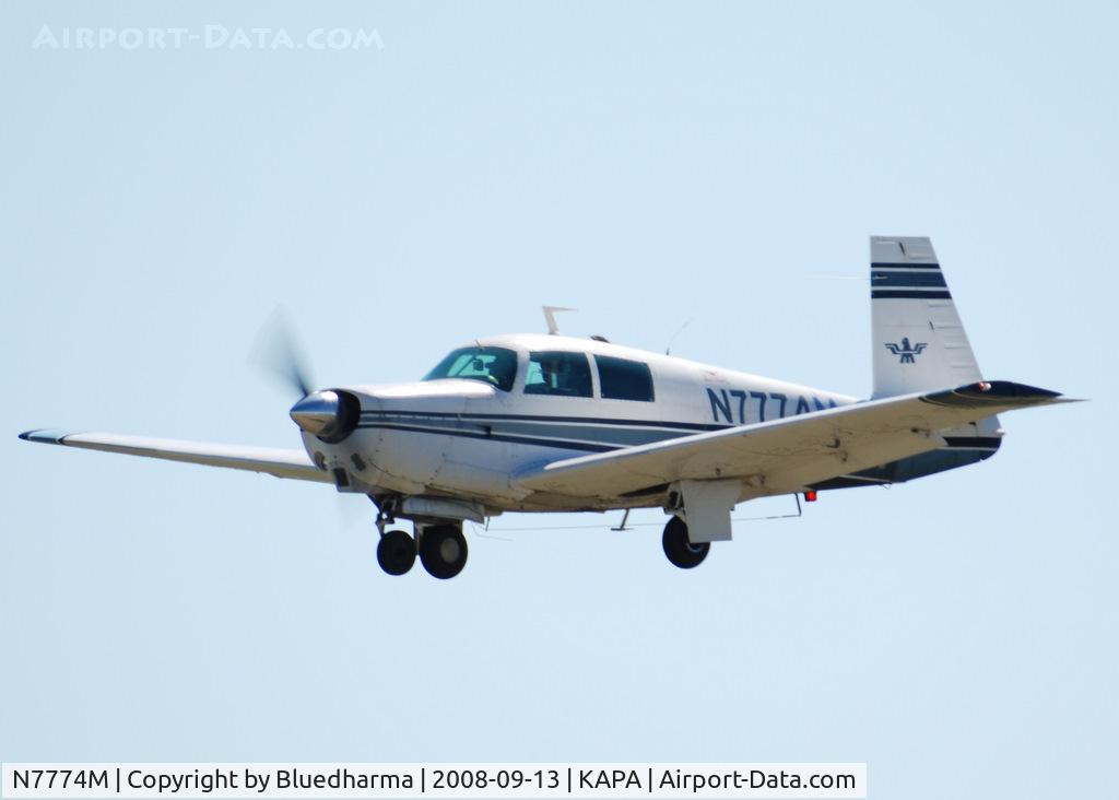 N7774M, 1974 Mooney M20C Ranger C/N 20-0020, On approach to 35L.