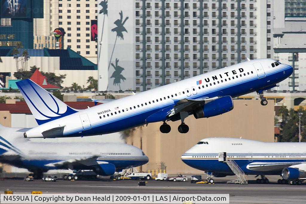 N459UA, 2000 Airbus A320-232 C/N 1192, United Airlines N459UA (FLT UAL1534) departing RWY 1R enroute to Chicago O'Hare Int'l (KORD) with a couple of casino jets (Lockheed L-1011 & Boeing 747SP) in the background.