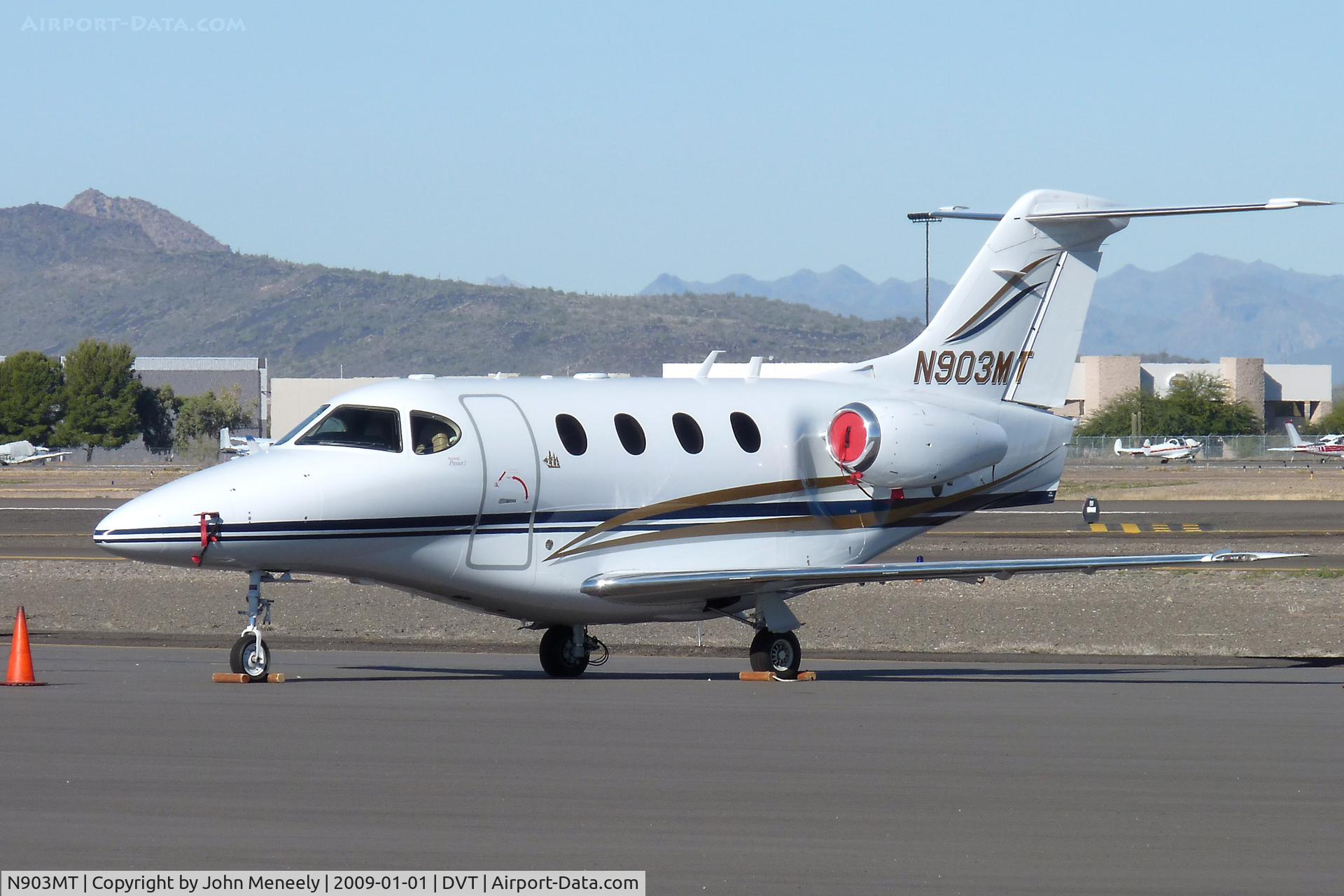 N903MT, 2001 Raytheon Aircraft Company 390 C/N RB-24, Parked near the terminal