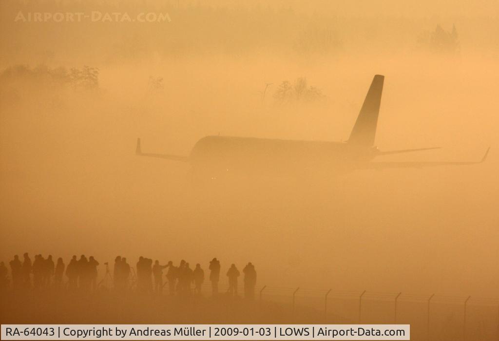 RA-64043, 2008 Tupolev Tu-204-100S C/N 64043, Early morning impression with many spotters waiting for a sunny day.