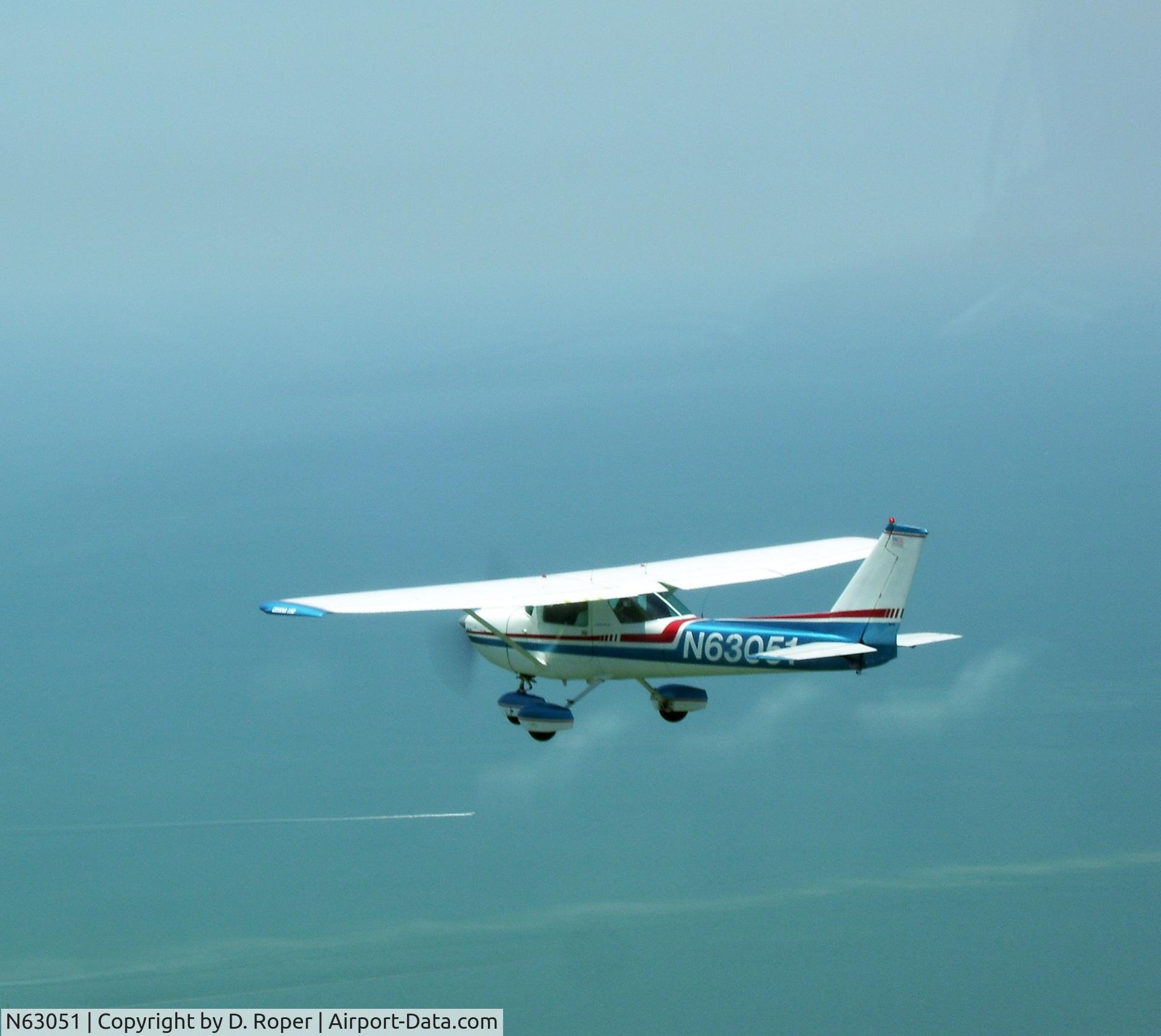 N63051, 1975 Cessna 150M C/N 15077065, In flight south of CDK