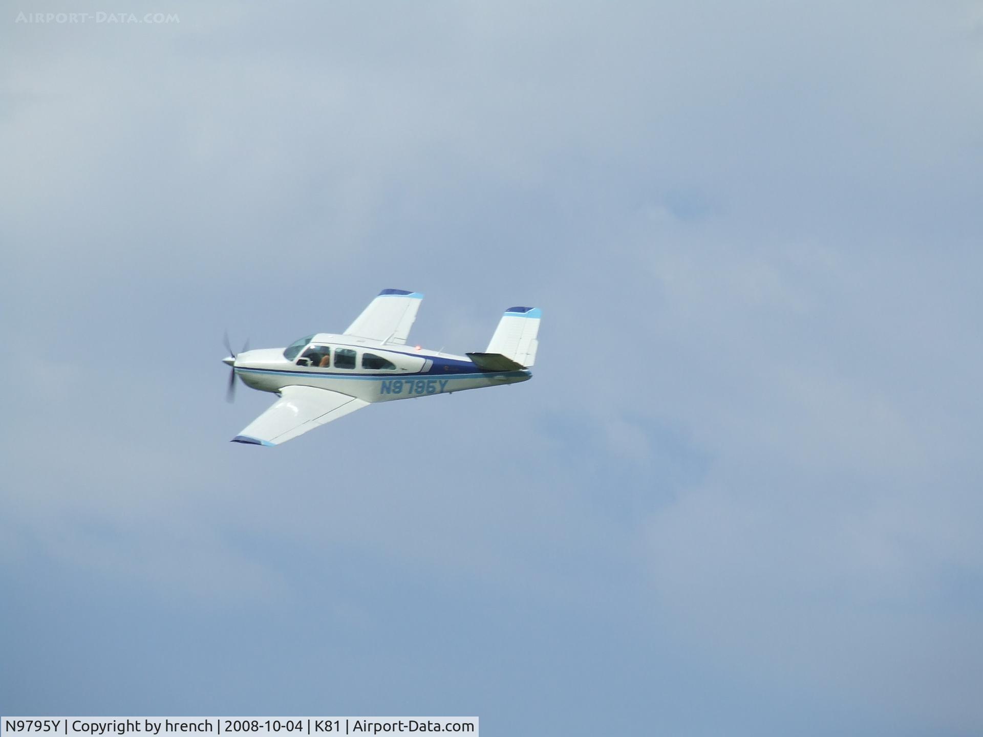 N9795Y, 1963 Beech P35 Bonanza C/N D-7170, Nice V-tail at Miami Co airport days