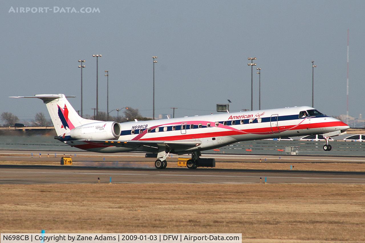 N698CB, 2004 Embraer ERJ-145LR (EMB-145LR) C/N 14500877, American Eagle landing at DFW - Special Paint - Susan G. Komen Race for the Cure