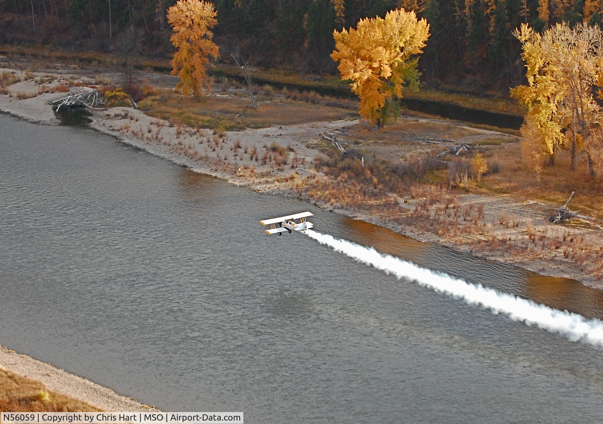 N56059, 1941 Boeing A75 C/N 75-905, Flying low over Clark Fork River