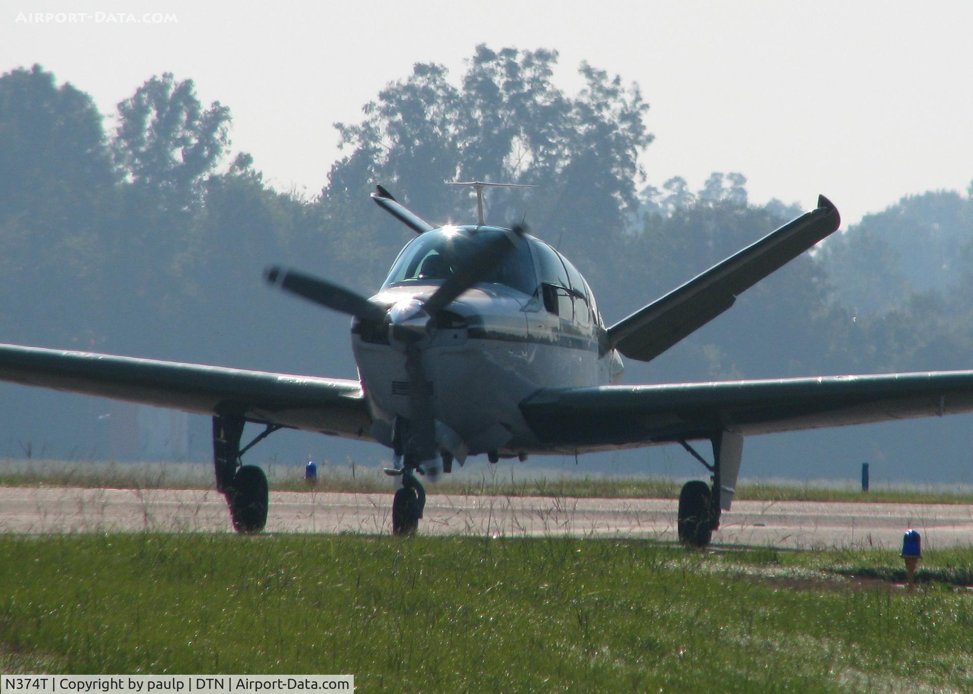 N374T, 1966 Beech V35 Bonanza C/N D-8165, Taxiing  to runway 14 at the Downtown Shreveport airport.